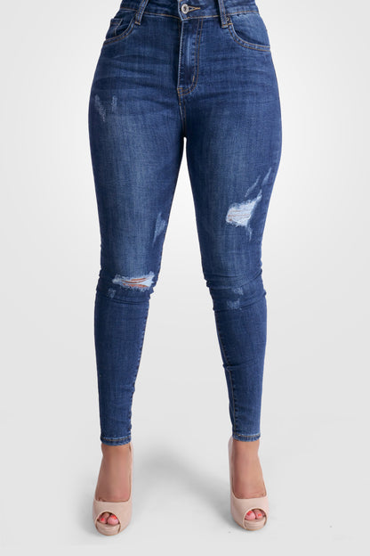 BLAUE STRETCH-JEANS MIT KRATZERN MIT MITTLERER TAILLE